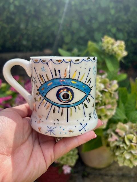 Evil Eye Mug by Jayne Redmond – Hand‑Painted Ceramic with 24 Carat Gold.