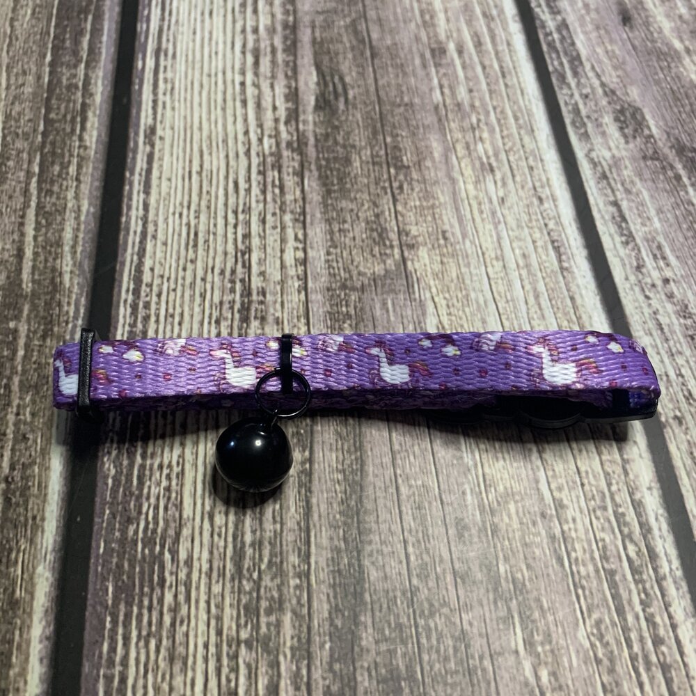 Daydreams & Unicorns cat collar with unicorn print, quick release buckle, and black bell