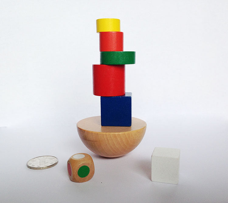 Wooden hemisphere balance puzzle toy for kids aged 3+, multicolor, lightweight, and educational.