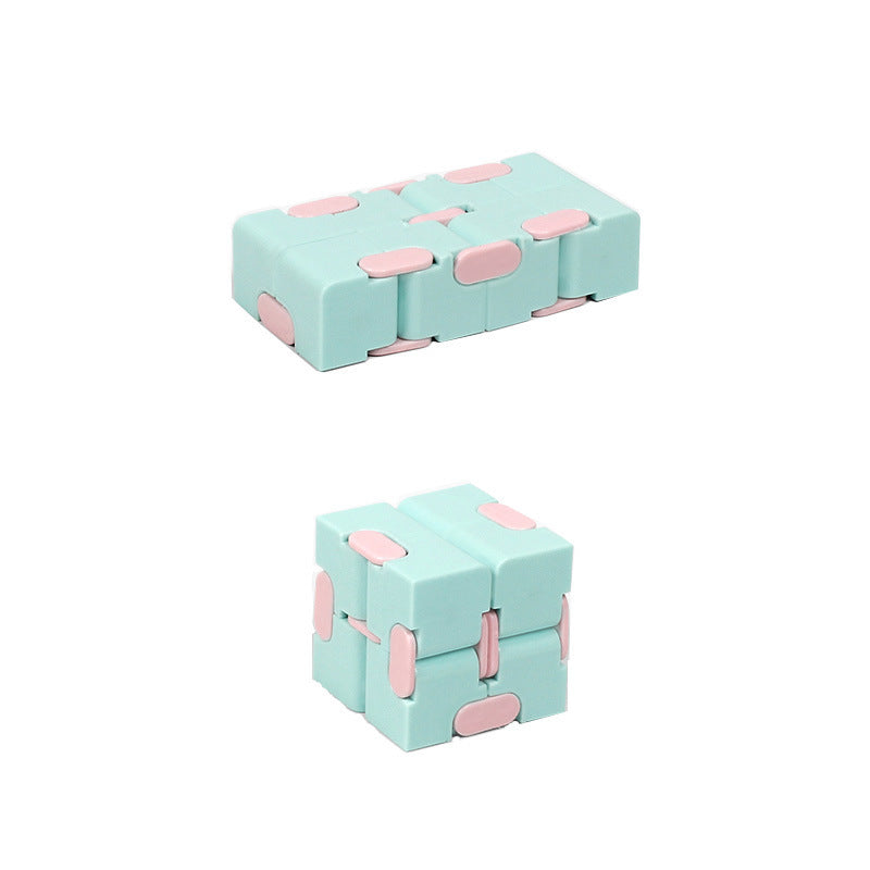 Infinity Cube finger puzzle with 8 rotating cubes, compact stress-relief toy in random colors.