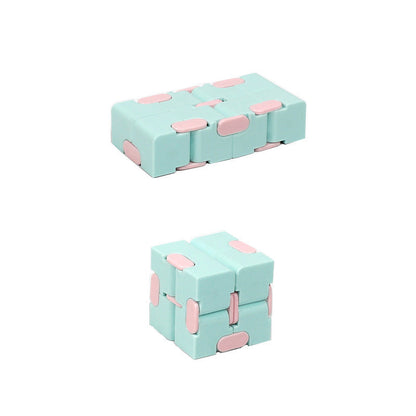 Infinity Cube finger puzzle with 8 rotating cubes, compact stress-relief toy in random colors.