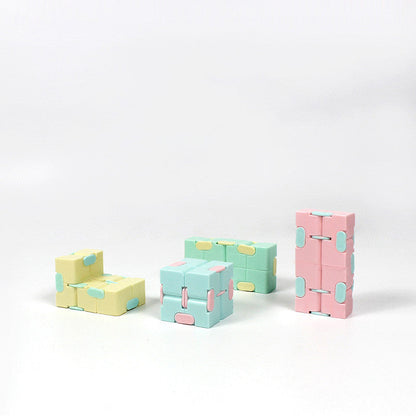 Infinity Cube finger puzzle with 8 rotating cubes, compact stress-relief toy in random colors.