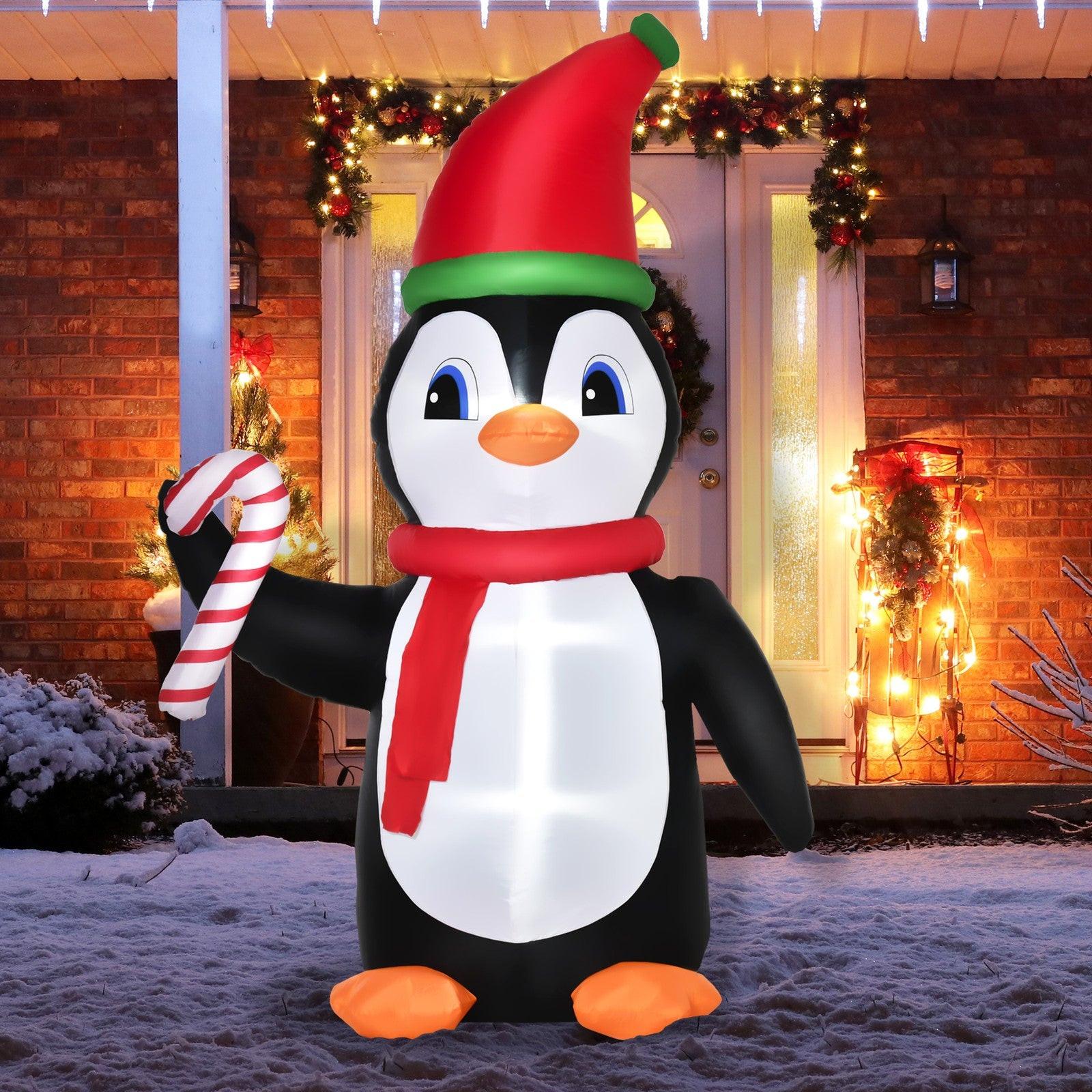 8FT Inflatable Christmas Penguin Holding Candy Cane – LED-Lit Outdoor Decoration | Waterproof, Self-Inflating.