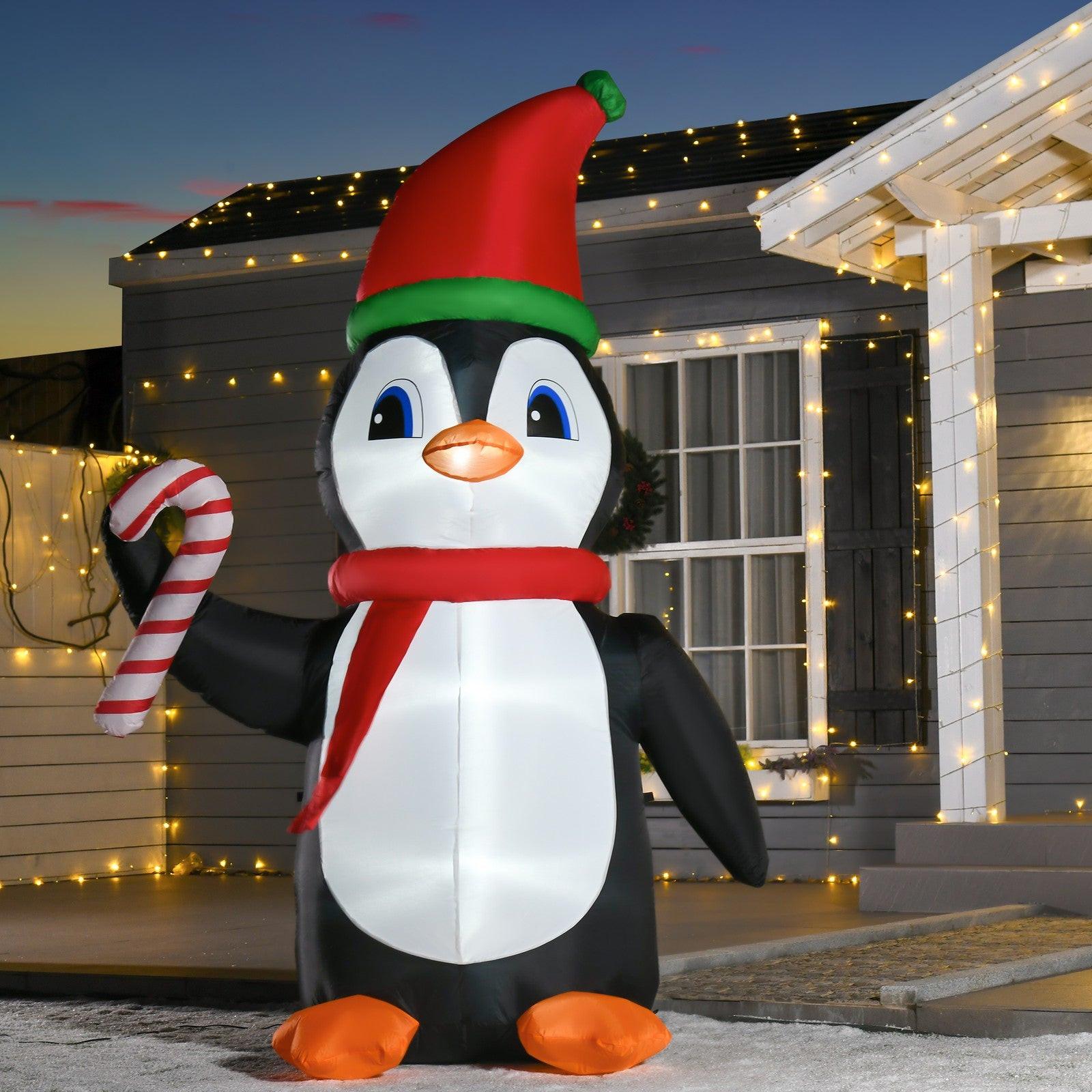 8FT Inflatable Christmas Penguin Holding Candy Cane – LED-Lit Outdoor Decoration | Waterproof, Self-Inflating.