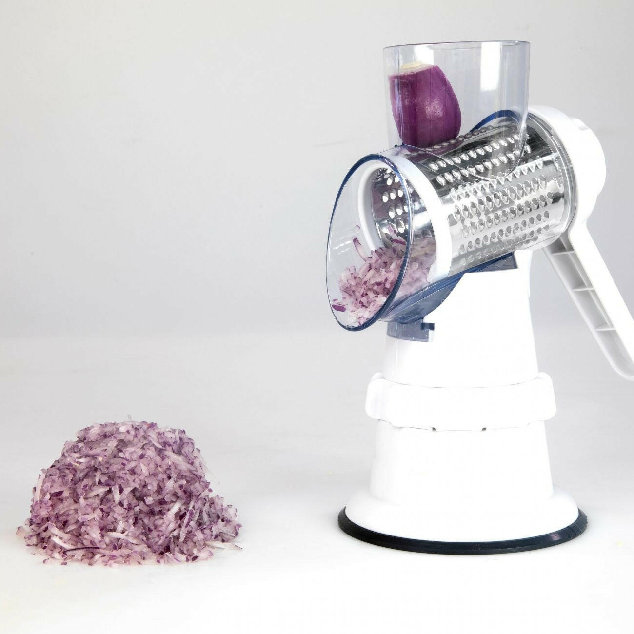 3-in-1 Manual Rotary Vegetable Slicer – Grater, Shredder & Chopper in One.