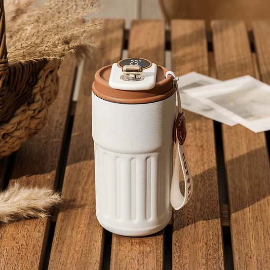 Smart LED insulated cup with temperature display. Stainless steel, car-mounted & eco-friendly. Keeps drinks hot or cold for hours. Brilliant for on the go!