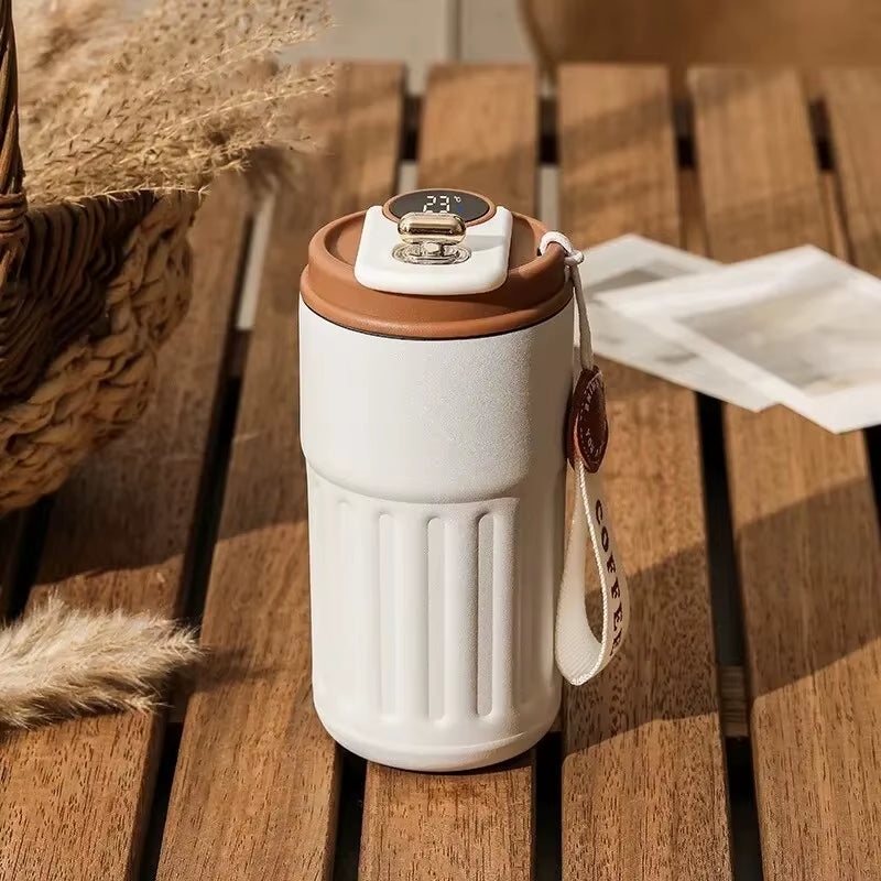 Smart LED insulated cup with temperature display. Stainless steel, car-mounted & eco-friendly. Keeps drinks hot or cold for hours. Brilliant for on the go!