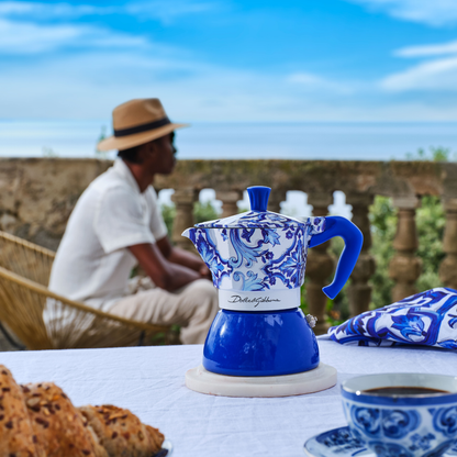 Elegant Bialetti coffee maker paired with Dolce&Gabbana luxury style for a sophisticated lifestyle experience.