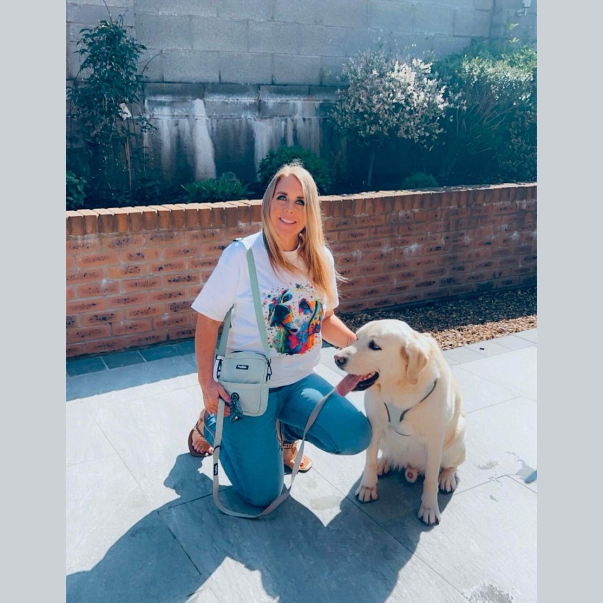 Mini dog walking bag in sage green waterproof nylon, crossbody design with zip compartments & poo bag dispenser