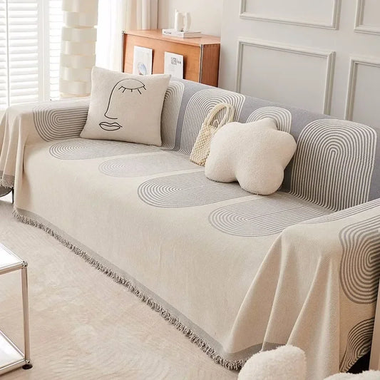 Nordic chenille jacquard sofa throw blanket with plush texture & tassel accents. Breathable, insulating & perfect for home, travel & modern interiors!