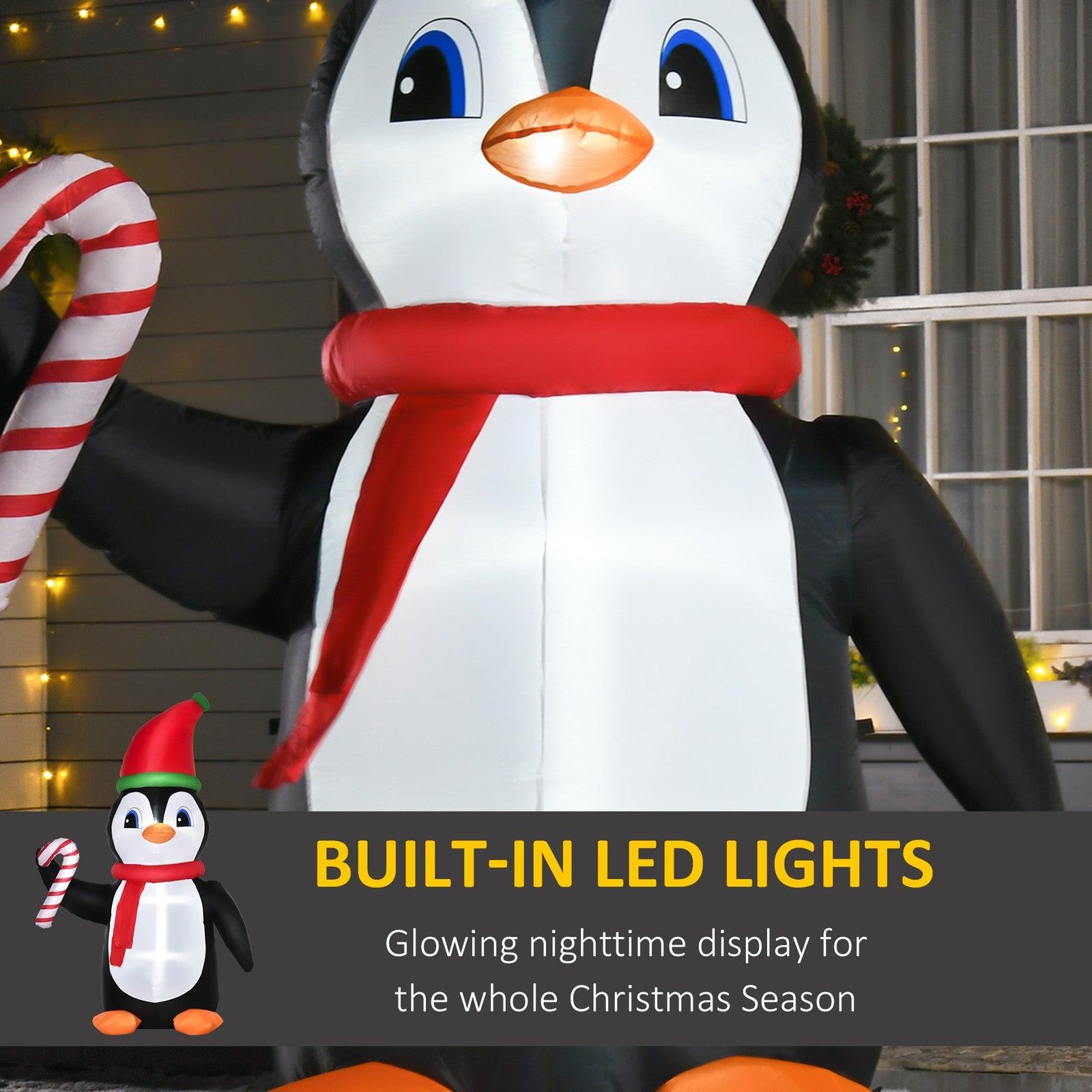 8FT Inflatable Christmas Penguin Holding Candy Cane – LED-Lit Outdoor Decoration | Waterproof, Self-Inflating.
