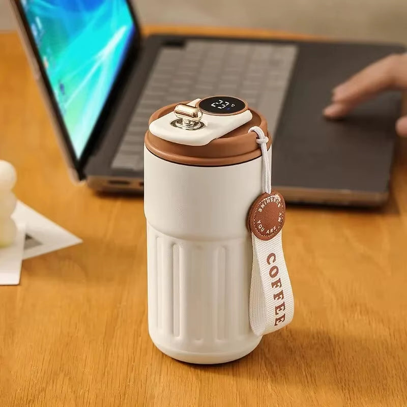 Smart LED insulated cup with temperature display. Stainless steel, car-mounted & eco-friendly. Keeps drinks hot or cold for hours. Brilliant for on the go!
