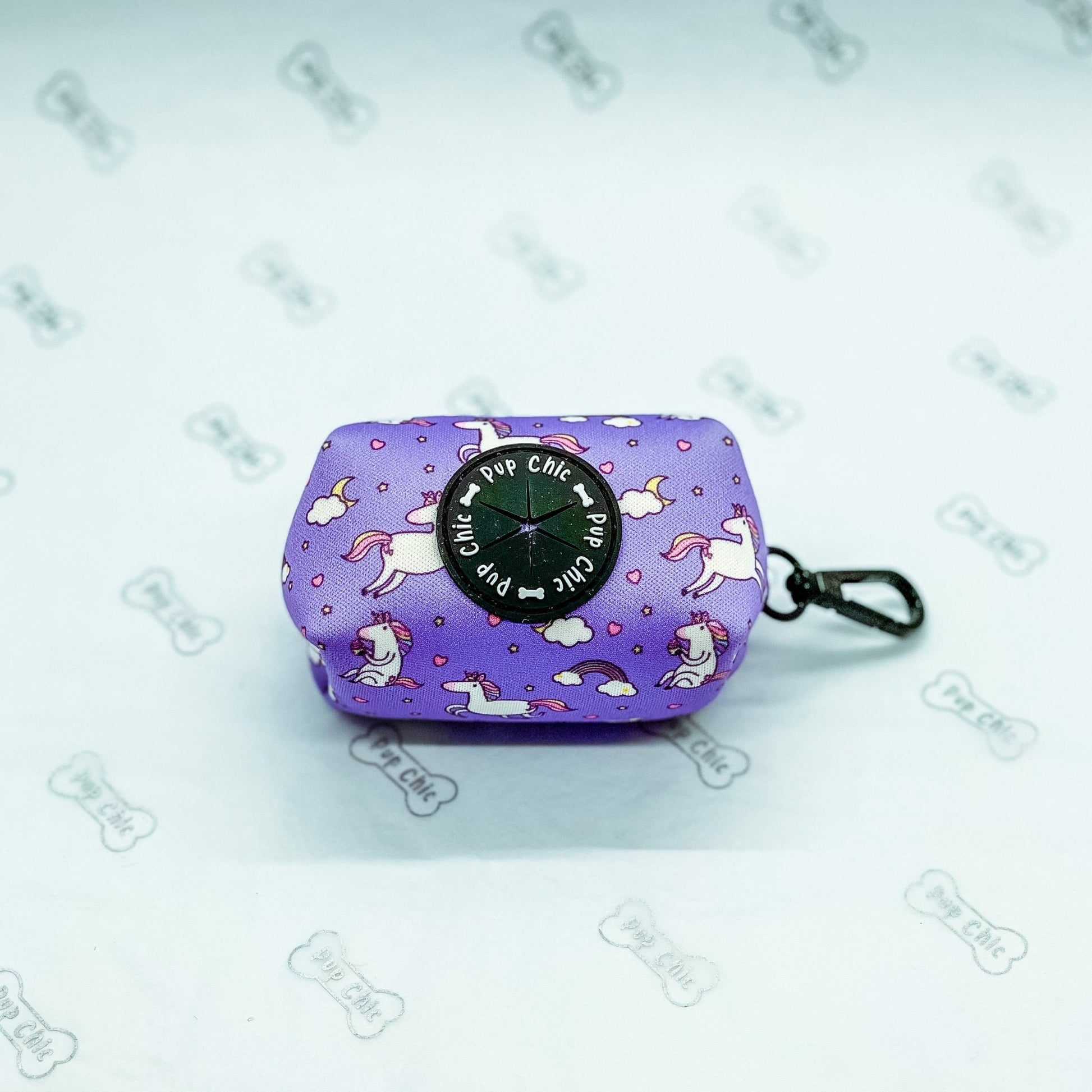 Daydreams & Unicorns clip‑on poo bag holder with unicorn print, fits rolls, treats, and keys