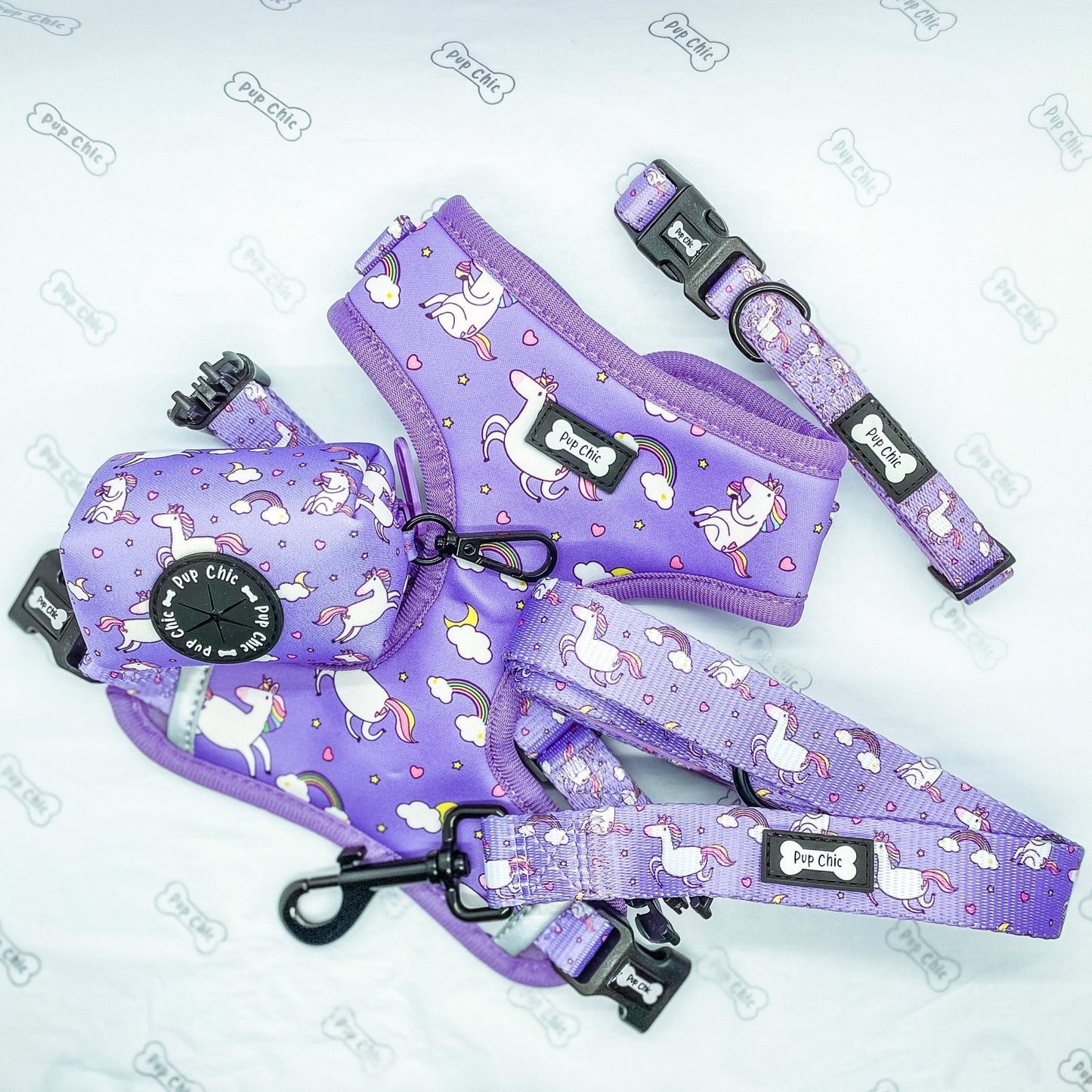 Daydreams & Unicorns clip‑on poo bag holder with unicorn print, fits rolls, treats, and keys