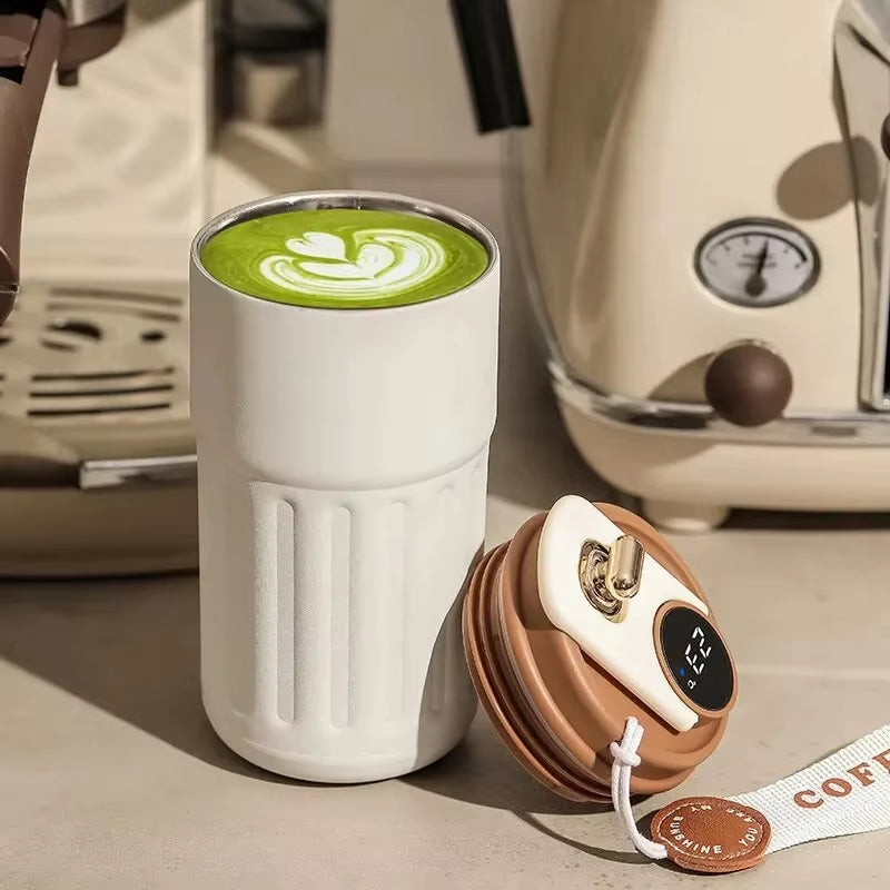 Smart LED insulated cup with temperature display. Stainless steel, car-mounted & eco-friendly. Keeps drinks hot or cold for hours. Brilliant for on the go!