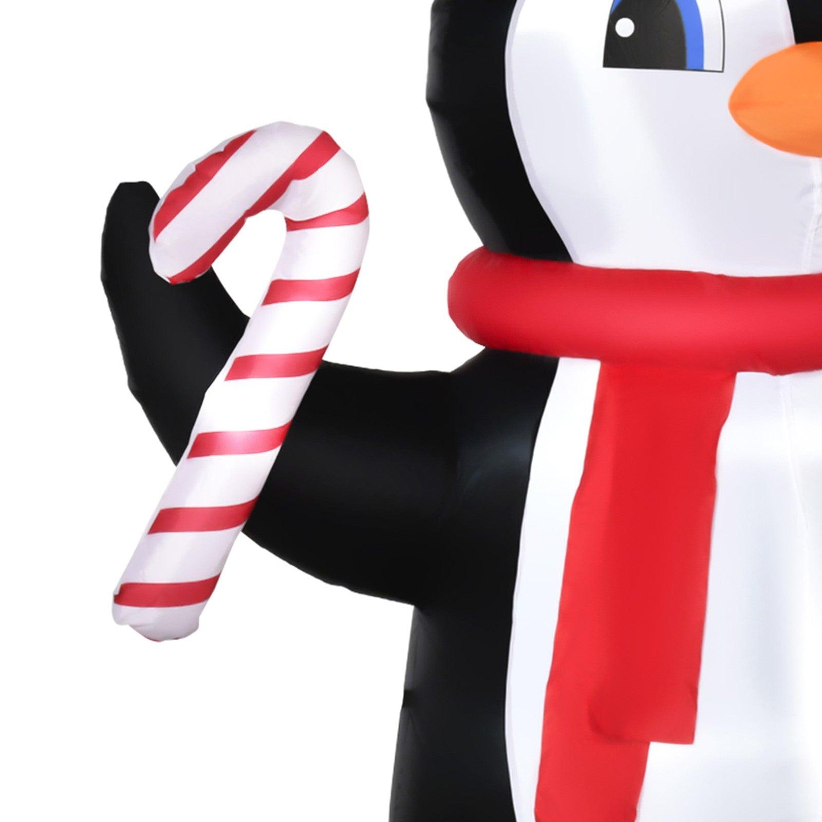 8FT Inflatable Christmas Penguin Holding Candy Cane – LED-Lit Outdoor Decoration | Waterproof, Self-Inflating.