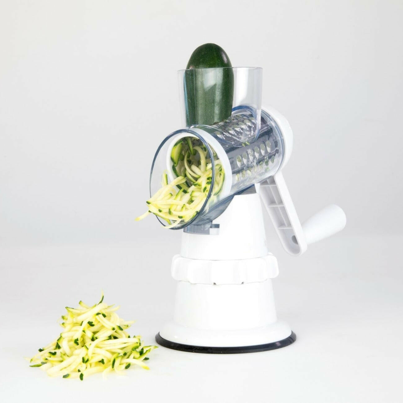 3-in-1 Manual Rotary Vegetable Slicer – Grater, Shredder & Chopper in One.