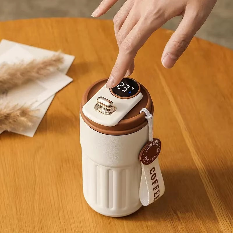 Smart LED insulated cup with temperature display. Stainless steel, car-mounted & eco-friendly. Keeps drinks hot or cold for hours. Brilliant for on the go!