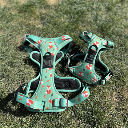 Inquisitive Fox tactical dog harness, rust‑orange woodland fox print, no‑pull design with top handle