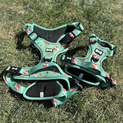 Inquisitive Fox tactical dog harness, rust‑orange woodland fox print, no‑pull design with top handle