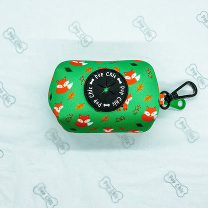 Inquisitive Fox clip‑on poo bag holder with colourful fox print, fits rolls, treats, and keys