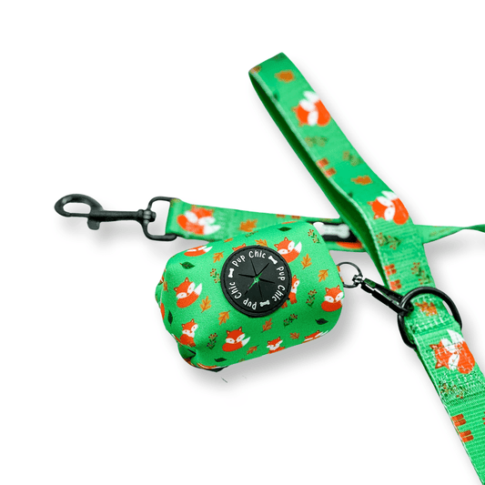 Inquisitive Fox clip‑on poo bag holder with colourful fox print, fits rolls, treats, and keys