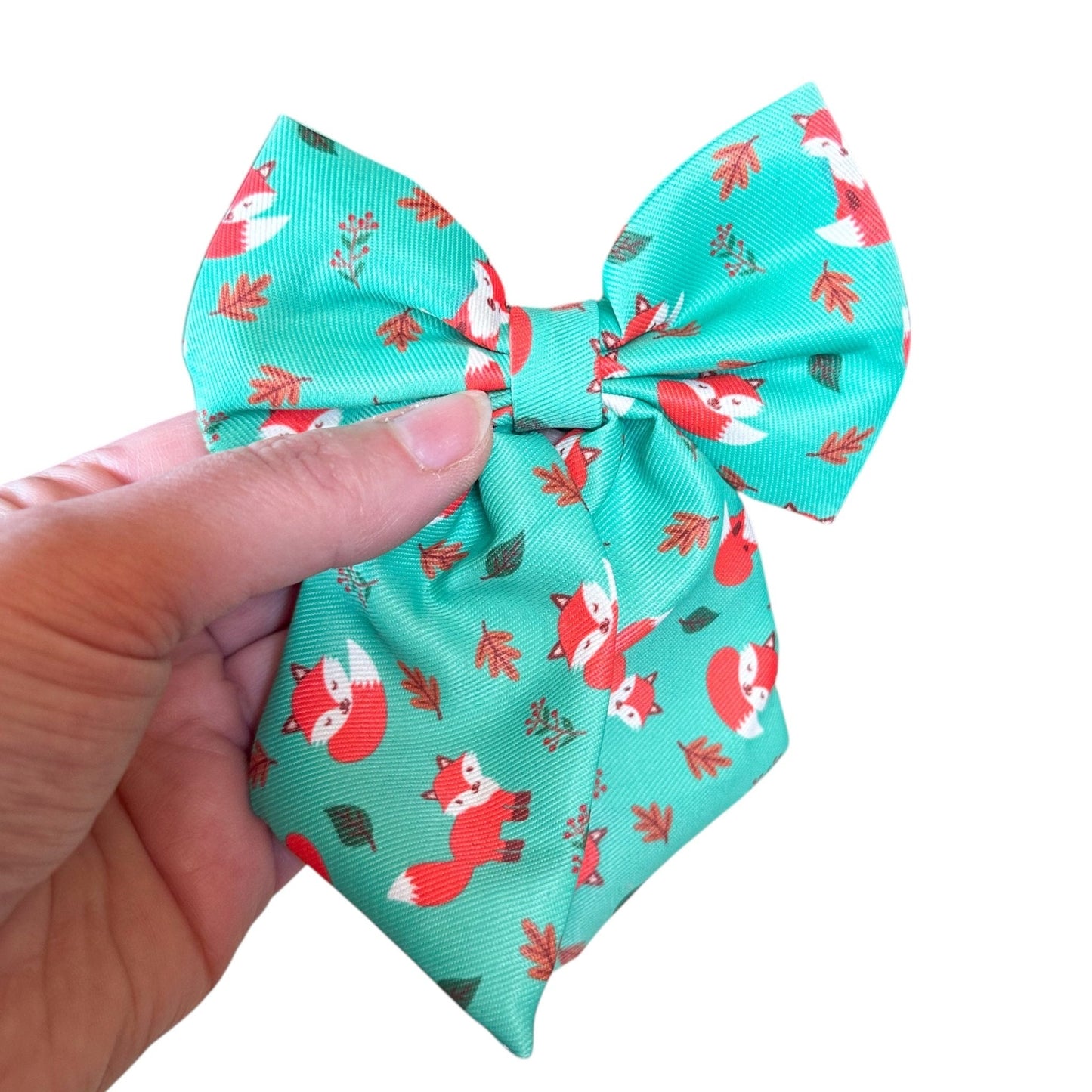 Inquisitive Fox sailor bow tie, teal background with sloth print, Velcro fastening for collars & harnesses