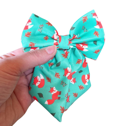 Inquisitive Fox sailor bow tie, teal background with sloth print, Velcro fastening for collars & harnesses