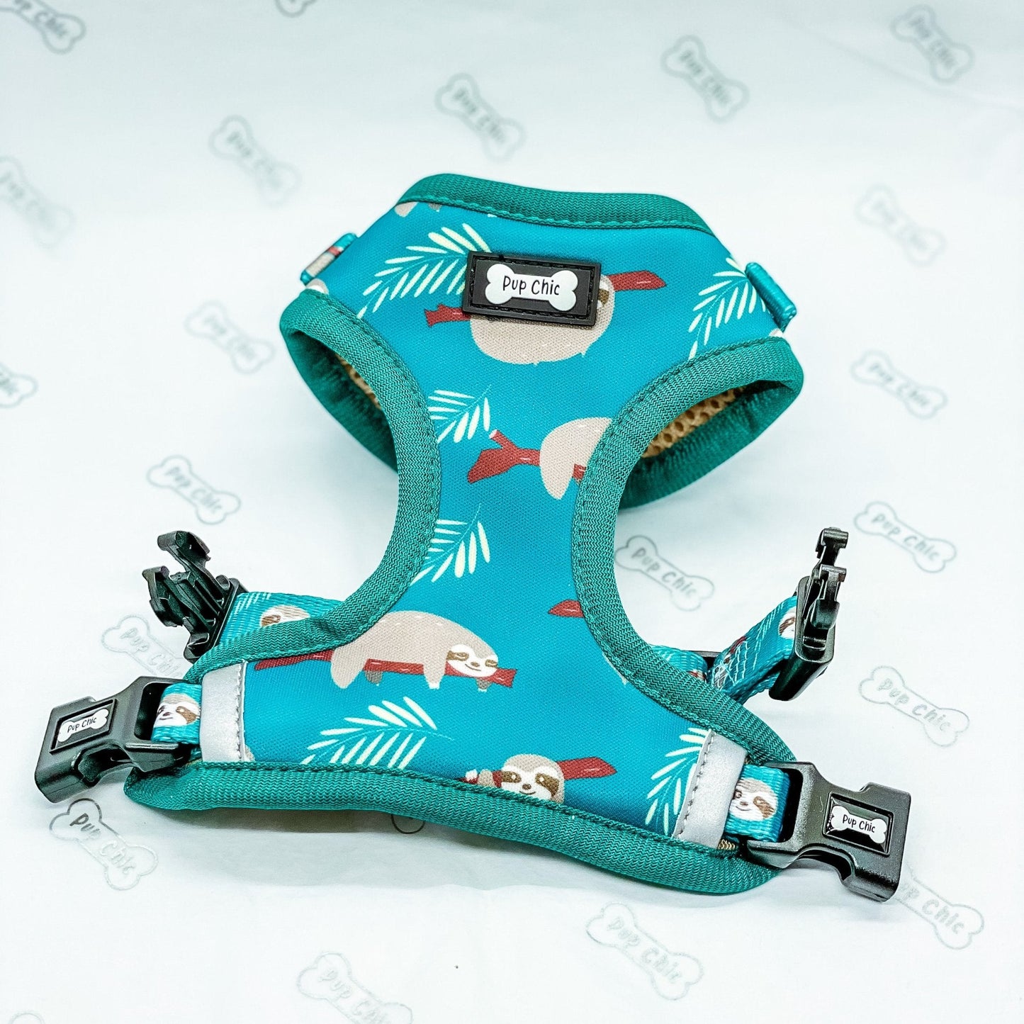 Lazy Sloth XXS puppy harness in teal with sloth print, adjustable straps for toy breeds