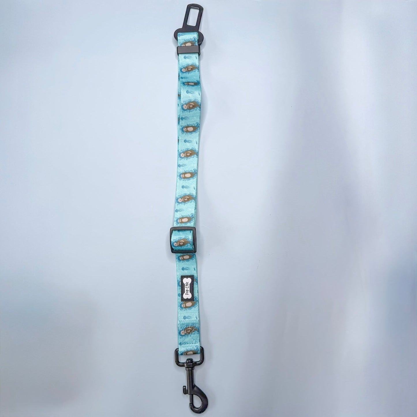 Otterly Lovely adjustable dog seat belt clip in mustard yellow with insect print