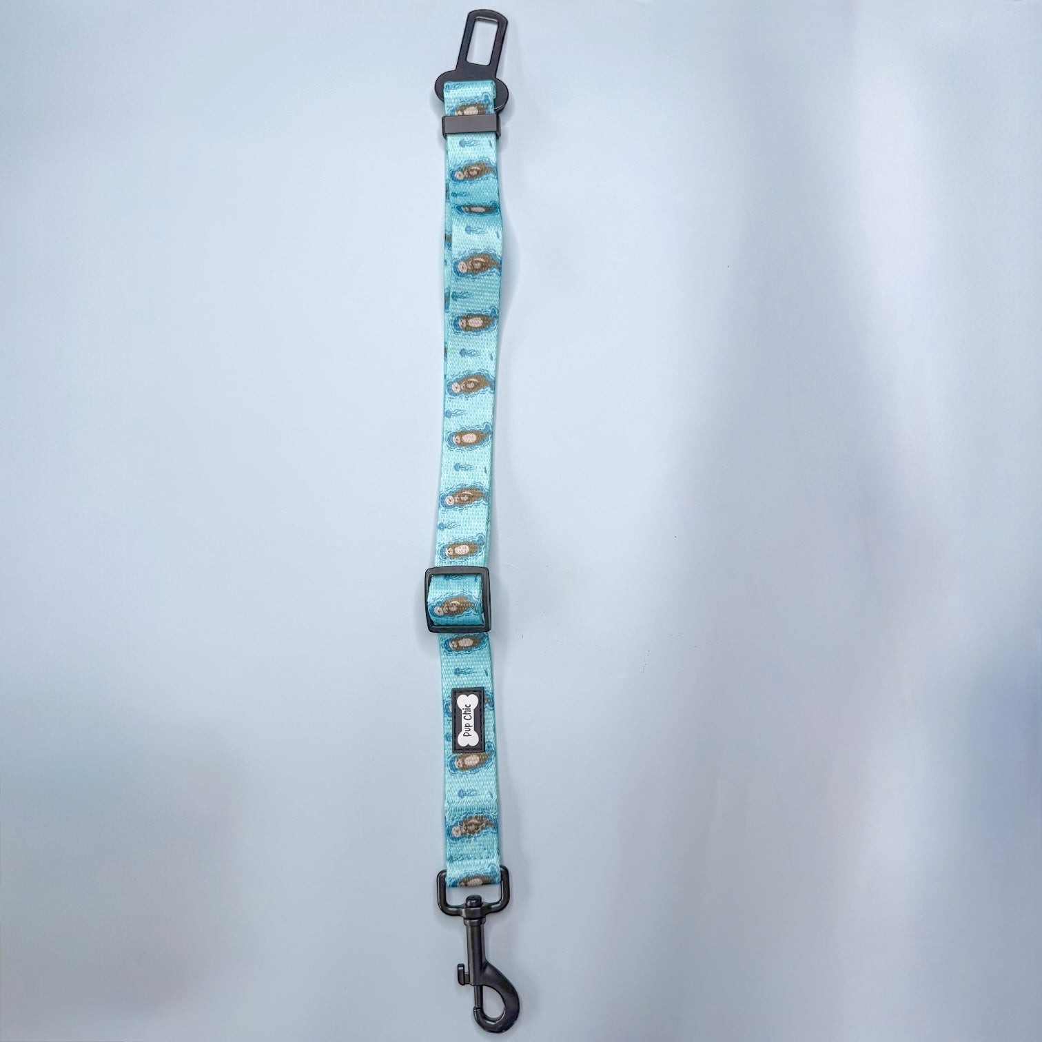 Otterly Lovely adjustable dog seat belt clip in mustard yellow with insect print