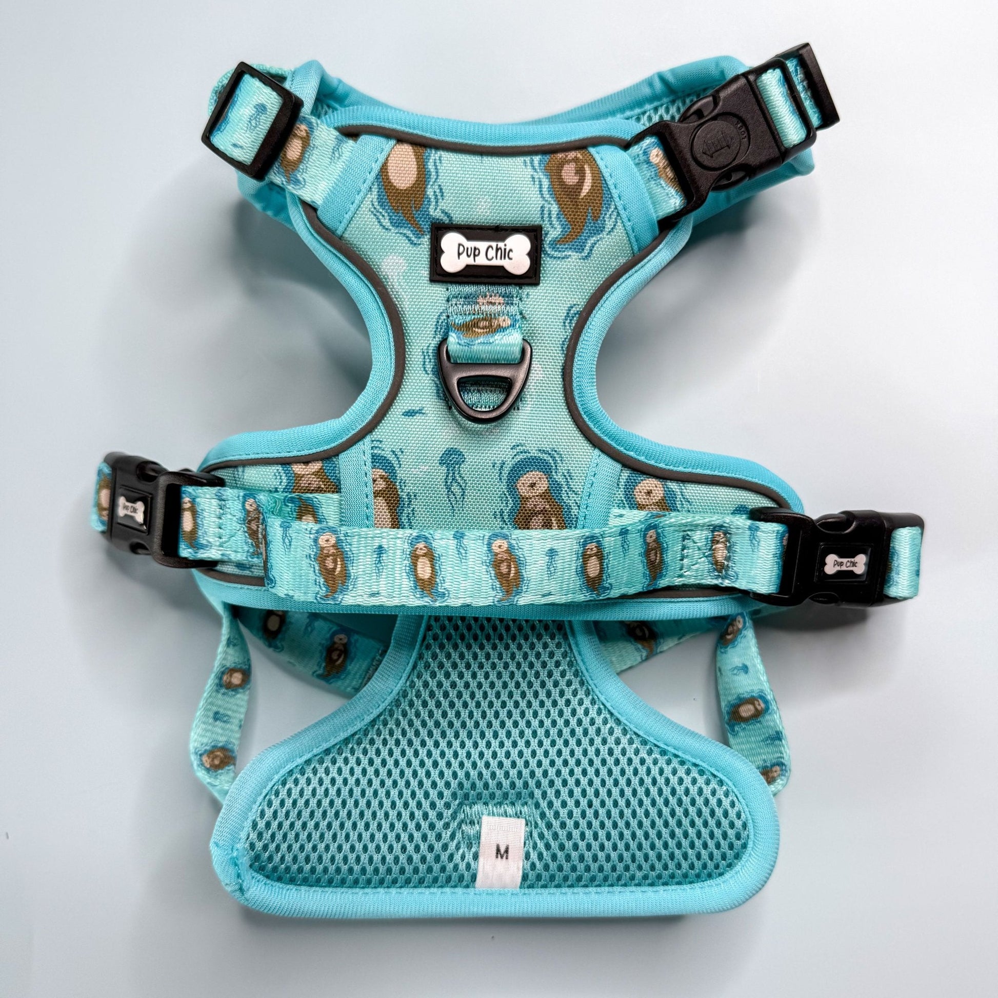 Otterly Lovely aqua tactical dog harness with sea otter print, no‑pull design and top handle