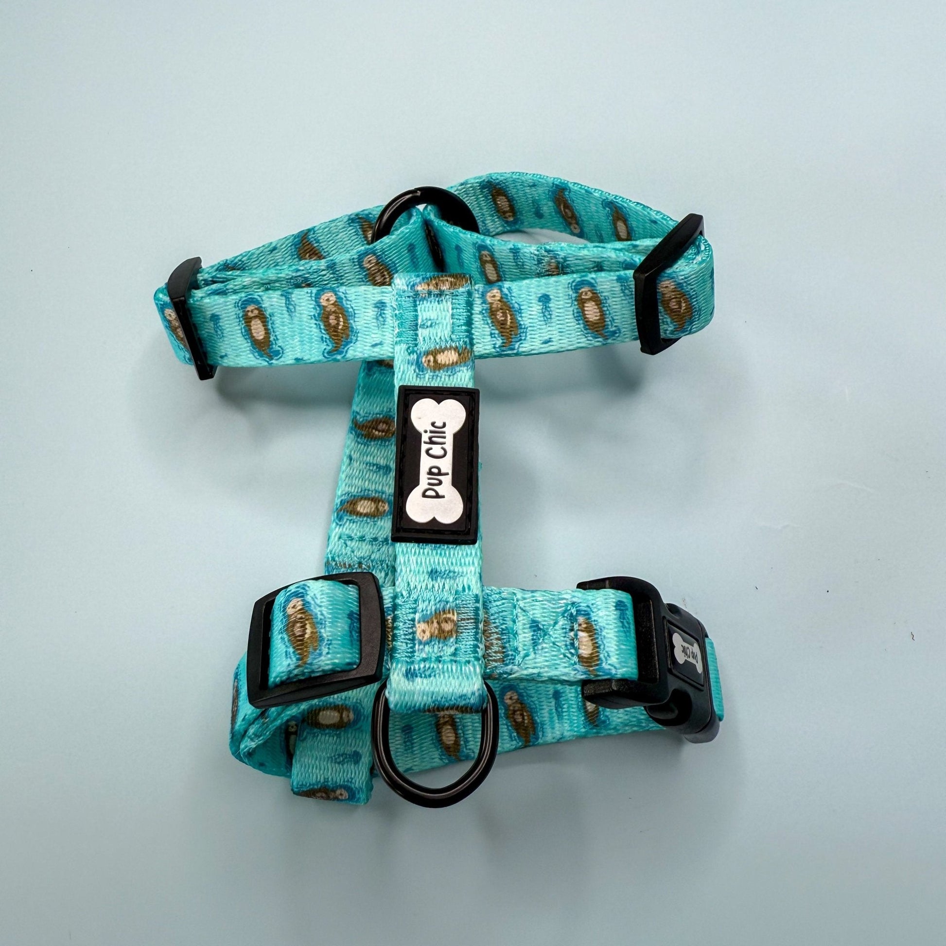 Otterly Lovely XXXS aqua puppy harness with otter print, adjustable straps for teacup dogs, kittens & rabbits