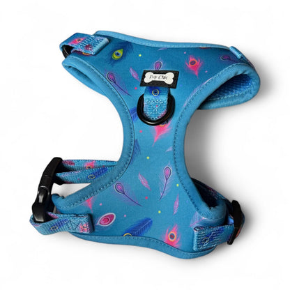 Power Peacock step‑in dog harness in teal with peacock feather print, adjustable neck and chest straps