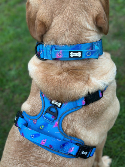 Peacock Power tactical dog harness, teal base with peacock feather print, durable no‑pull design for strong dogs
