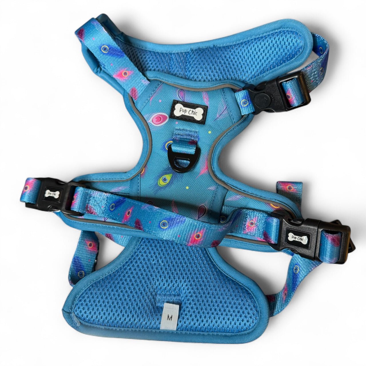 Peacock Power tactical dog harness, teal base with peacock feather print, durable no‑pull design for strong dogs