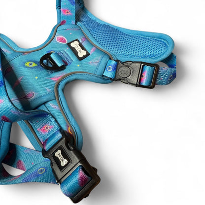 Peacock Power tactical dog harness, teal base with peacock feather print, durable no‑pull design for strong dogs
