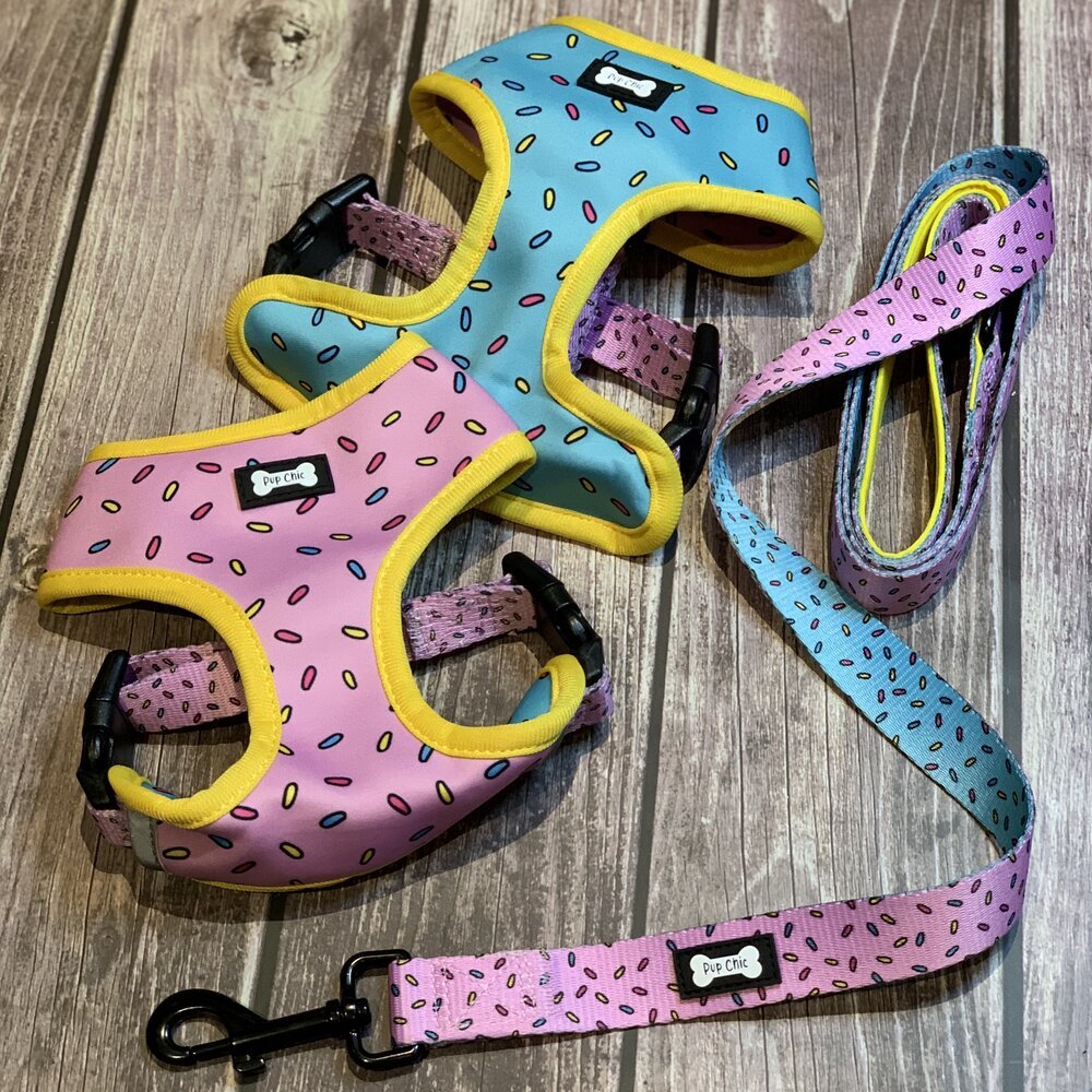 Sprinkles for Days reversible dog harness with pink and blue sprinkle prints, donut‑inspired design