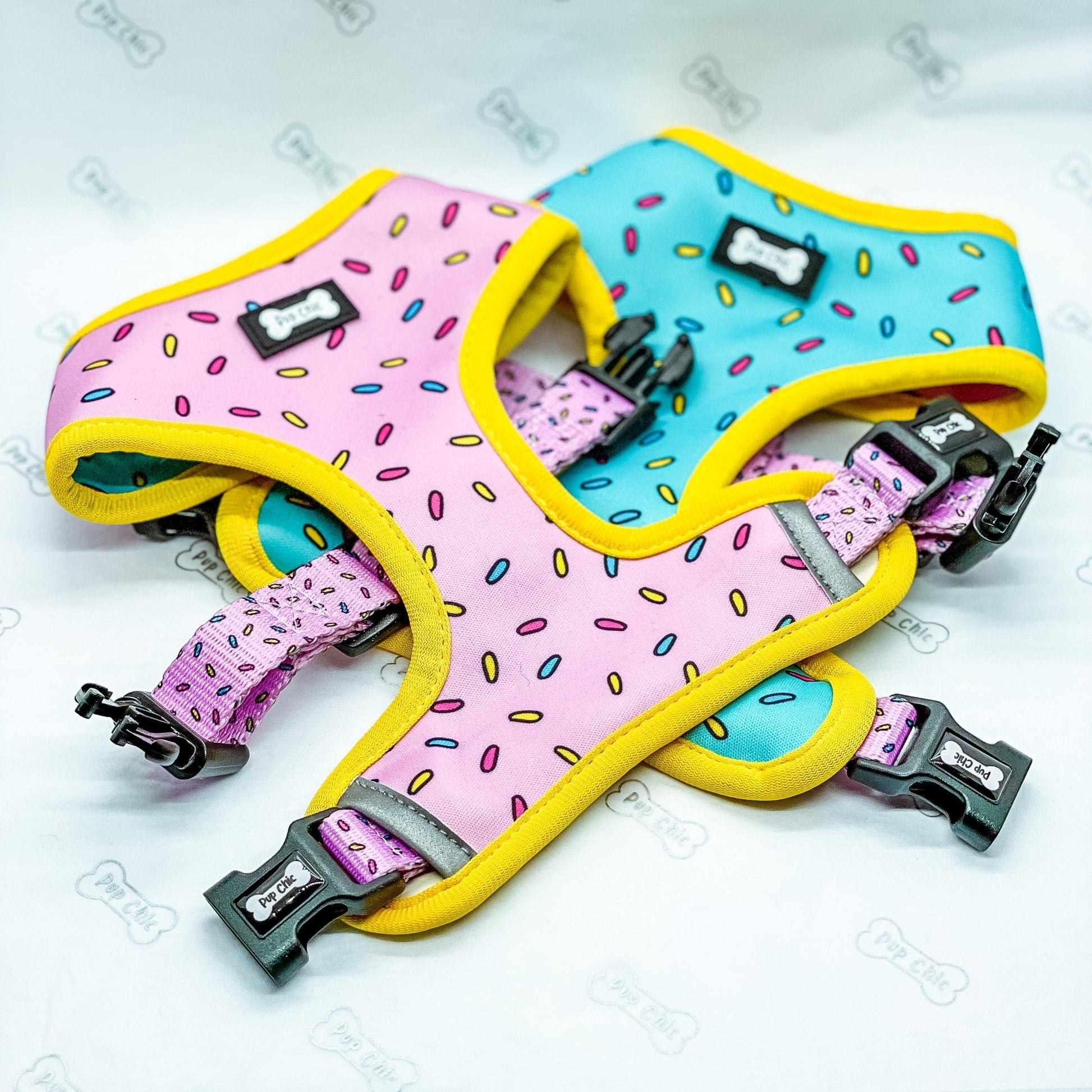 Sprinkles for Days reversible dog harness with pink and blue sprinkle prints, donut‑inspired design