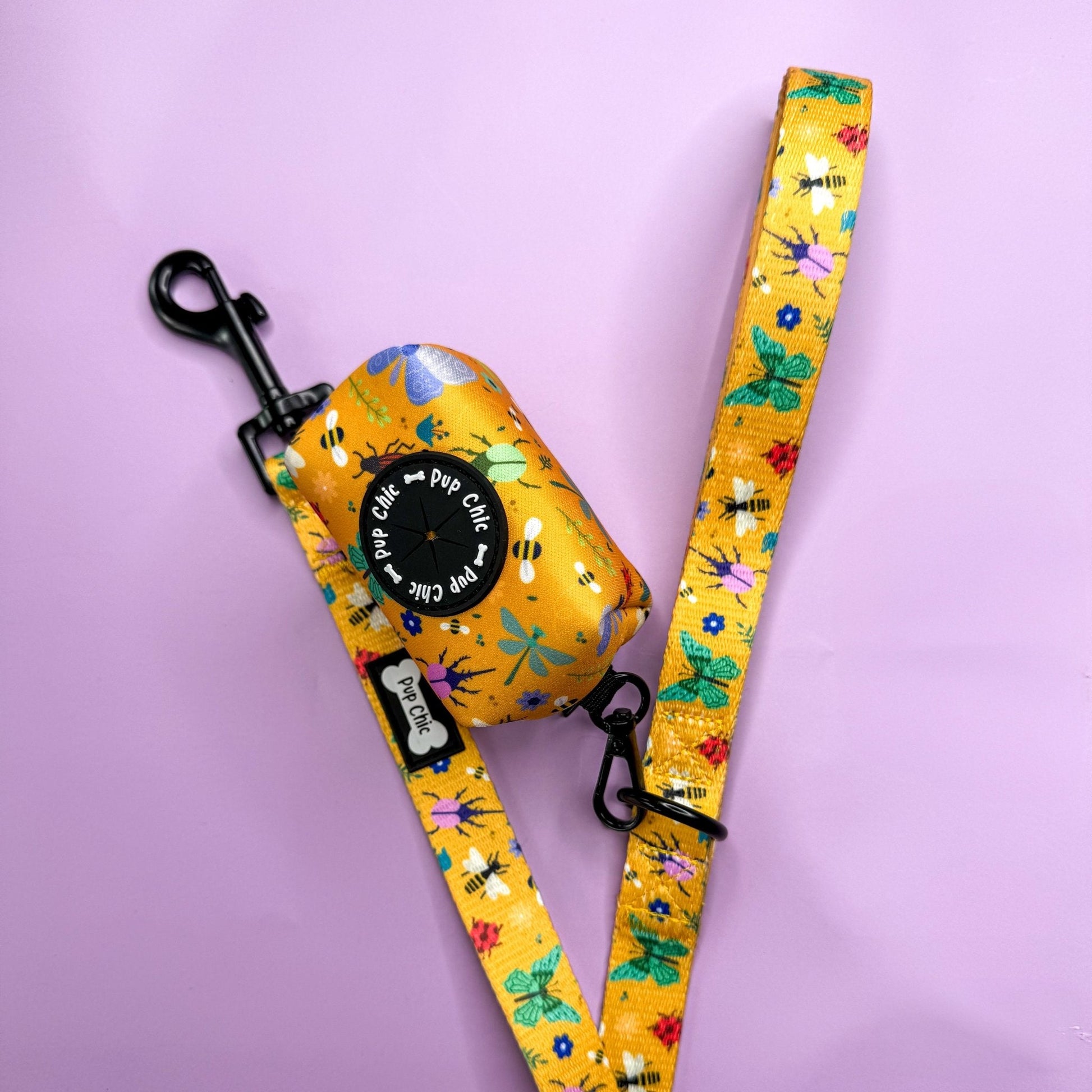 Summer Buzzin’ mustard yellow poo bag holder with bees, butterflies, moths & ladybirds print