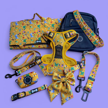 Summer Buzzin’ mustard yellow poo bag holder with bees, butterflies, moths & ladybirds print