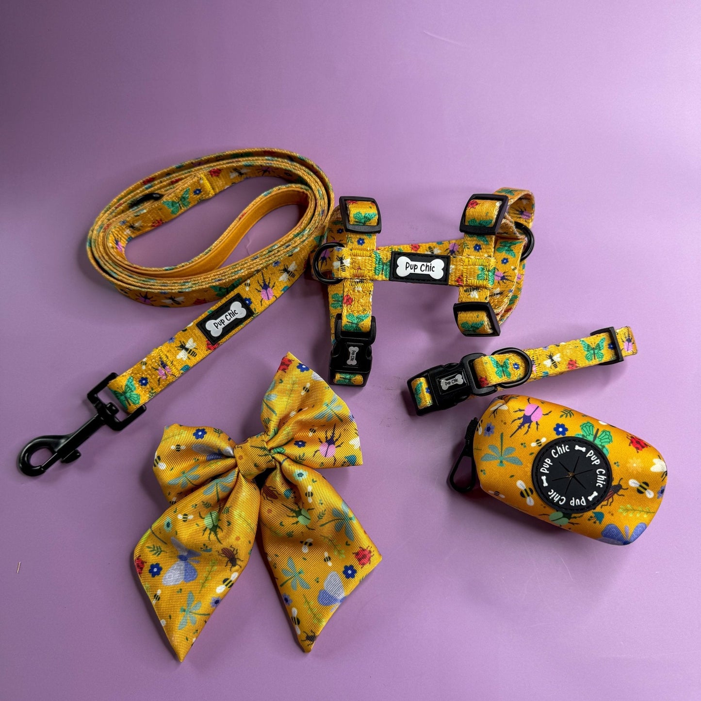 Summer Buzzin’ XXXS puppy harness in mustard yellow with colourful insect print, adjustable straps for tiny pets
