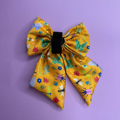 Summer Buzzin’ mustard yellow sailor bow with insect print, Velcro fastening, available in two sizes